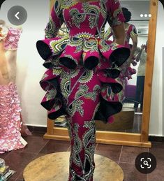 here is our Well turned out Ankara mixture.Made for all event. This dress is made with 100% cotton African print. The dress is made to order so customisation is welcome.We can add or remove anything you wish. You are welcome to request a change of fabrics as well.We have lots of fabric options available. If you have any question please do feel free to start a chat. Thank you for visiting our store. Traditional Peplum Dress With Ruffles, Traditional Pink Peplum Dresses, Traditional Fitted Dresses For Ceremonies, Traditional Peplum Wedding Dress, Fitted Gown With Traditional Patterns For Ceremonies, Traditional Peplum Dress For Festive Occasions, Traditional Fitted Midi Dress For Party, Multicolor Peplum Dress For Party, Fitted Floor-length Dresses For Traditional Ceremonies