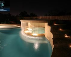 an iphone screen shot of a pool with lights and water features in the bottom right corner