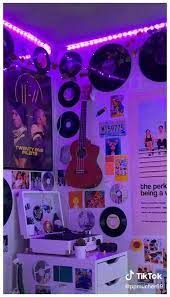 a room filled with lots of different types of musical instruments and pictures on the wall