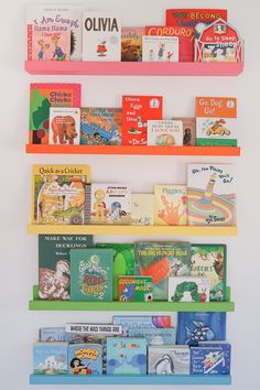 colorful bookshelves with children's books on them