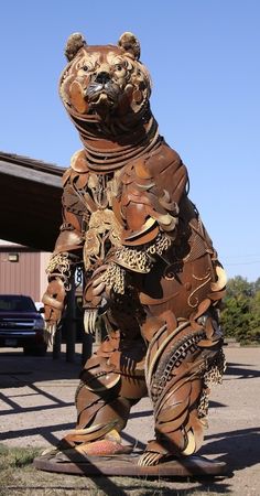 a statue of a bear made out of leather