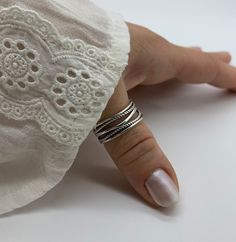 🧡 Indulge in the allure of our Multi Layer Chunky Silver Thumb Ring, a dainty yet captivating piece designed exclusively for women. Its intricate layers and chunky silver construction create a striking visual effect that is both fashionable and versatile. The open adjustable design ensures a comfortable fit on any finger, making it the perfect accessory for everyday wear.  🧡 Crafted with exquisite attention to detail, this weaved layered ring embodies modern elegance and timeless style. Looking for a meaningful gift? This thumb ring makes an exceptional choice for mothers, symbolizing the unbreakable bond between a mother and child. Treat yourself or someone special to this exquisite silver ring and let its beauty speak volumes. Discover the perfect balance between sophistication and sen Adjustable Wide Band Open Ring, Bohemian Rings For Anniversary, Silver Engraved Stackable Ring, Silver Thumb Rings For Women, Thumb Rings For Women, Sterling Silver Thumb Rings, Chunky Silver Rings, Thumb Rings Silver, Layered Rings