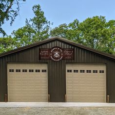 two garages are shown in front of some trees