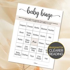 a baby shower game is shown with the words baby bingo written in cursive font