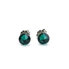 Dress your ears in elegance with these emerald titanium stud earrings. The earrings feature gorgeous emerald crystals affixed to titanium earring posts and backs. Perfect for sensitive ears, you can safely wear these hypoallergenic and nickel-free titanium studs throughout the entire day without any irritation. ★ crystal ~ 6.5 mm★ high-quality titanium stud earrings★ length post ~ 9.5 mm / 0.375"★ grade #1 titanium pad and post★ a pair of titanium grade #1 earring backs are included★ comes in a Titanium Earring Studs, Nickel Allergy, Titanium Earrings, Nickel Free Earrings, Free Earrings, Earring Posts, Swarovski Crystal Earrings, Green Crystal, Swarovski Earrings