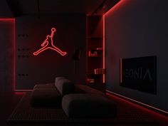 a living room filled with furniture and neon lights on the wall above it is a basketball logo