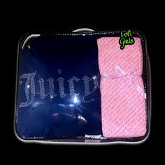 a pink and blue suitcase with the word sorry on it's side, wrapped in plastic