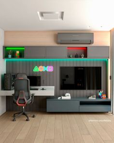 a room with a chair, desk and television on the wall next to an entertainment center