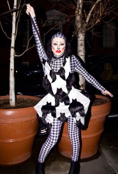 Fur and satin houndstooth patterned and shaped club kid drag fashion