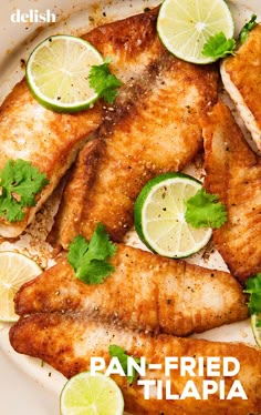 fish with limes and cilantro on a plate