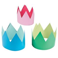 three paper crowns sitting next to each other