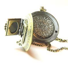 "Engagement wedding photo locket steampunk necklace, silver or old gold (bronze) colored surprise gift box for 4 favorite photos, for 2 wedding rings, pill container, ring box. This vintage locket can hold a four favorite pictures of someone special and can be worn close to your heart! Gift for girlfriend, gift for boyfriend, gift for a loved one... Silver colored round box, book box and chain - made to order, I will send photos. Old gold (bronze) round box, book box and chain - ready, you see i Surprise Gift Box, Ring Box Engagement, Personalized Ring Box, Vintage Locket, Engagement Gifts For Her, Locket Ring, Pill Container, Round Locket, Engagement Picture