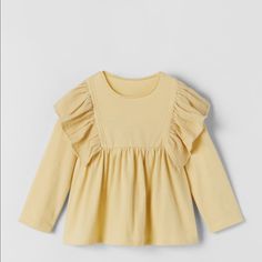 Zara Nwt 3-4y Oversized Ruffled Blouse. Light Yellow. 100 % Cotton. Yellow Zara Tops With Ruffles, Yellow Ruffled Zara Tops, Zara Yellow Ruffled Tops, Cute Long Sleeve Tops For Playdate, Cute Long Sleeve Zara Blouse, Cute Zara Long Sleeve Blouse, Cute Ruffle Blouse For Fall, Spring Long Sleeve Tops For Playdate, Cute Ruffled Solid Color Tops