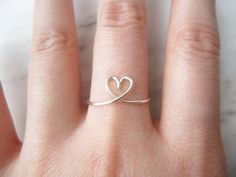 Adjustable Heart Ring//silver heart ring heart midi ring | Etsy Dainty Adjustable Tiny Heart Ring, Handmade Minimalist Heart Ring, Minimalist Handmade Heart Ring, Minimalist Handmade Heart-shaped Ring, Dainty Heart Midi Promise Rings, Minimalist Adjustable Heart-shaped Midi Rings, Delicate Heart-shaped Stackable Rings For Gifts, Minimalist Tiny Adjustable Heart Ring, Dainty Heart-shaped Tiny Midi Rings