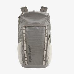 the back pack is grey and white