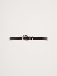 Designed and fitted to be worn on the hips, this skinny-width belt is crafted from a sturdy cut of leather and secured with a single buckle with beveled edges.  Single buckle closure.  Designed to be worn at the hips.  Designed to be worn at the hips.  Width: 1" (2. 5cm) XXS: 27-31" XS: 29-33" S: 31-35" M: 33-37" L: 36-40" XL: 40-44" XXL: 44-48" Beveled Edge, Leather Belt, Women's Accessories, Banana Republic, Dark Brown, Buckle, Leather, Design