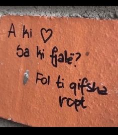 graffiti written on the side of a brick wall that says, ahi love sa hi fak? foll ti affish rot