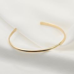 "14K gold cuff bracelet. 14K Gold Minimalist Cuff Bracelet, Delicate cuff bracelet. The bracelet will be shipped in a gift box * 14K solid gold. It is about 2.5mm width. Please select the size of your wrist. If your wrist is 6\", please purchase a 6\" bracelet. (If you order a 6\" bracelet, actual cuff length will be 5\" plus 1 inch opening.) Please read our policies before you place your order. https://www.etsy.com/shop/SashJewelry/policy?ref=shopinfo_policies_leftnav To see other Mother daught Mother Daughter Bracelet Set, Gold Infinity Bracelet, Infinity Charm Bracelet, Delicate Gold Bracelet, Daughter Bracelet, Gold Bar Bracelet, Mother Daughter Bracelets, Gold Cuff Bracelet, Mothers Bracelet