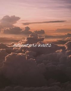 the words adventure await are above some clouds