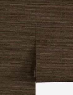 a close up view of the brown textured fabric on a window curtain with white trim