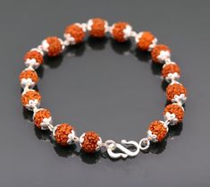 Sterling silver solid handmade natural rudraksha beads bracelet unisex jewlery form rajashthan india. Rudraksha is belong to god shiva. Metal-Sterling silverBrand-traditional-jewellery.Length-8.5 inchesWidth-7 mm approx.Weight-10.650 grams.type- braceletstone- Natural Rudrakshamakes excellent gifting and collectible pieces Rudraksha Bracelet, Belly Dance Jewelry, Rudraksha Beads, Foot Bracelet, Traditional Jewellery, Dance Jewelry, Mens Gold Jewelry, God Shiva, Silver Anklets