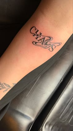 a person with a tattoo on their leg