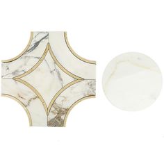 a white and gold marble tile with a circular hole in the middle on a white background