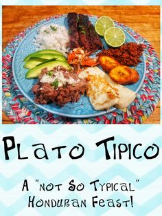 a blue plate topped with meat, rice and avocado on top of a wooden table