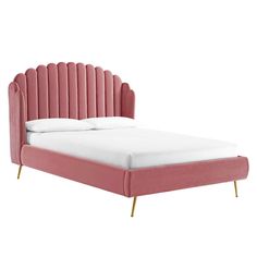 a bed with pink velvet headboard and foot board on it's sides, in front of a white background