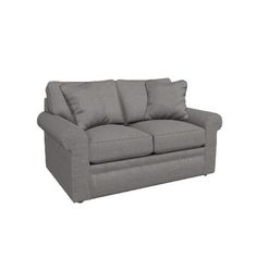 a gray couch sitting on top of a white floor