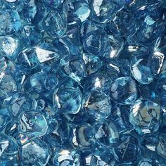 blue glass beads are shown in close up