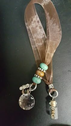 a lanyard with some charms attached to it