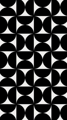 an abstract black and white pattern with circles