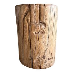 a close up of a wooden vase on a white background