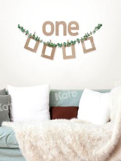 a living room filled with lots of furniture and decor on top of a white wall