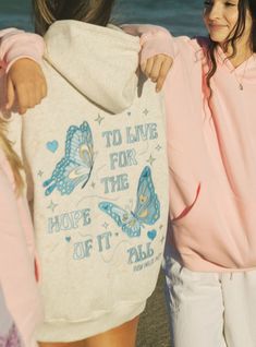 The "To Live For the Hope of it All" Oversized Hoodie is crafted from top-quality fabrics, while having an exquisite embroidery art of fine-detailed butterflies. The PPP palm embroidered above our hearts is a symbol of unity within the Pink Palm Puff community, reminding us all of the love we share. Purple Pink Palm Puff Hoodie, Pink Palm Puff Hoodie Purple, Hoodie Cute Outfit, Pink Palm Puff Hoodie Aesthetic, Butterfly Hoodie Aesthetic, Cute Sweatshirts Aesthetic, Pink Palm Puff Hoodie, Pink Palm Puff, Trendy Hoodies Women