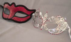 This is a gorgeous pair of masquerade red, black and silver grey masquerade masks, for him is a red phantom masquerade phantom mask we decorated with black glitter to enhance the eyes and look mysterious. For her is a laser cut masquerade laser cut silver/ grey mask decorated with red crystals to match his mask! If this is not the couples masquerade mask or his and hers masquerade mask that you were looking for I have other couples mask and designs in my shop. Please feel free to contact me anyt Red Fantasy Masquerade Mask For Costume Party, Red Eye Mask For Masquerade, Red Eye Mask As Gift, Red Eye Mask As A Gift, Red Eye Mask For Gift, Red Party Masks For Mardi Gras, Red Fantasy Party Mask, Red Eye Mask For Party, Red Eye Masks For Party