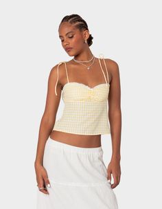 Have All Eyes On You In This Pretty Open Back Top. Its Unique Gingham Fabric And Feminine Lace Trim Will Surely Make The Statement You've Been After. Top. Tie Back Closure. Tie Straps. Open Back. Center Ruching. Lace Trim. Center Bow Detail. Gingham Pattern. 100% Polyester. Model Wears Size S. Model Height Is 5'11. Item Care: Wash With Similar Color. | Edikted Billie Open Tie Back Gingham Top Fit Checks, Gingham Top, Summer Vest, Tops Style, Fit Summer, Womens Camisoles, Plaid Outfits, Plaid Tie, Club Tops