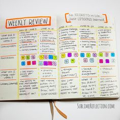 an open planner book with the words weekly review written in colorful blocks on top of it