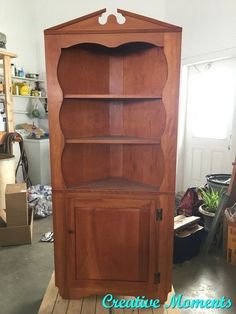 an old wooden bookcase is in the process of being refinished and repurposed