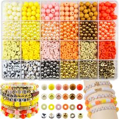 various beads and bracelets are arranged in a plastic box with the contents inside it