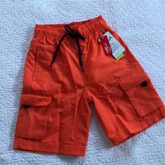 Orange With Black Tie Waist And Two Side Velcro Pockets. Inner Lining . Please See Photo For All Size Specs! Sports Gear, Kids Sports, Spf 50, Kids Bottoms, Black Tie, Color Orange, Orange, Sports, Black