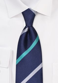 Necktie Product Details:
Handmade from woven microfiber
· Standard length of 58" (XL length also available - see below)
· Classic width of 3.1"
· Modern stripes in classic colors of navy blue, silver, and teal green
· Also available as matching pocket squares, skinny ties, and pocket squares
· Pair with all classic suits and sports coats
· Shipping weight: 2.0oz Tie Collection, Green Bows, Teal Green