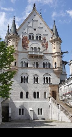 a large white building with lots of windows