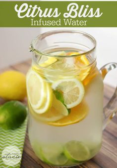 a pitcher filled with lemon and lime water