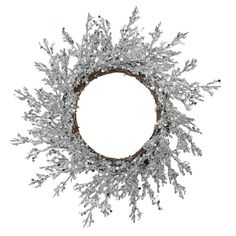 a wreath with white branches and silver tinsels on the top, against a white background