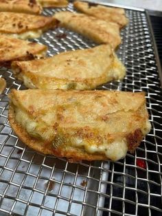 some food that is sitting on a metal rack