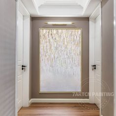 an empty hallway with a painting hanging on the wall