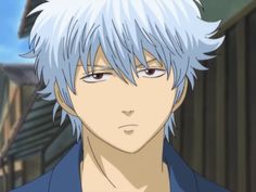 an anime character with blue hair looking at the camera