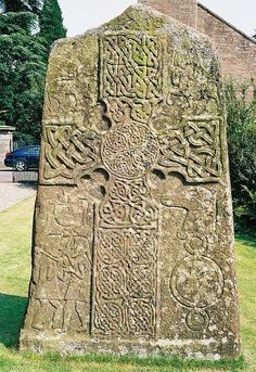 a large stone with intricate designs on it